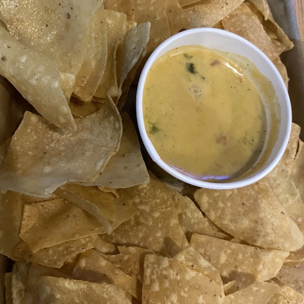 Chips and Queso. Absolutely disgusting. Chips were greasy as you can see, and the Queso was terrible. Chips and Queso. Absolutely disgusting. Chips were greasy as you can see, and the Queso was terrible.