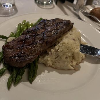Monroe's Restaurant - 12oz NY Strip Steak - Italian Near Me - Rochester, New York Monroe's Restaurant - 12oz NY Strip Steak - Italian Near Me - Rochester, New York