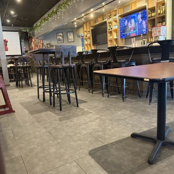 Iza Robata - Dining area by bar - Bubble Tea Near Me - College Station, Texas Iza Robata - Dining area by bar - Bubble Tea Near Me - College Station, Texas