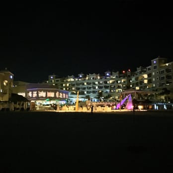 Panama Jacks - Nighttime view of resort from beach. - Resorts Near Me - Cancún, ROO