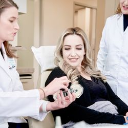 Oceanic Dental - Patient education is key to better oral and overall health!  Dr. Kate and Dr. Pham with patient at Oceanic Dental