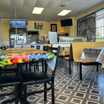 Cocina Guatemalteca - tables and chairs in a restaurant - Latin American Near Me - Tulsa, Oklahoma