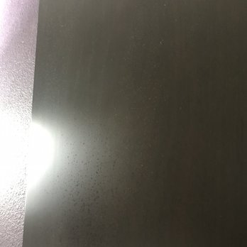 La Quinta by Wyndham Claremore - Dusty dirty splattered headboard - Hotels Near Me - Claremore, Oklahoma