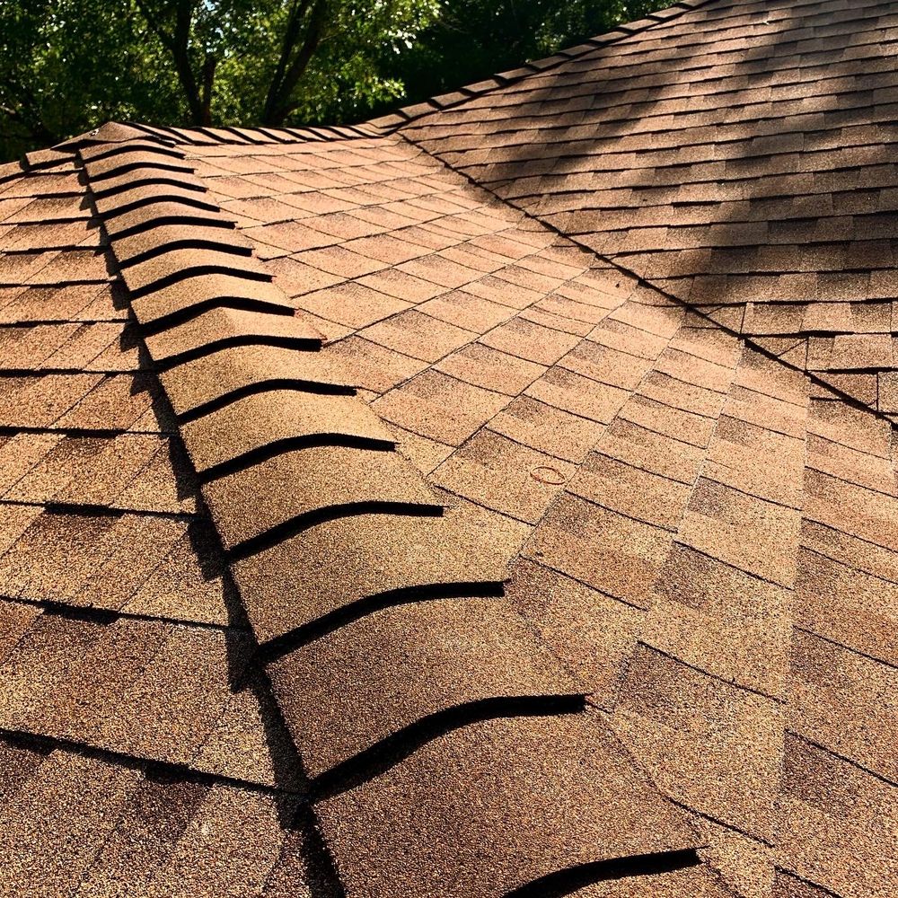 Slide of Top Tier Roofing