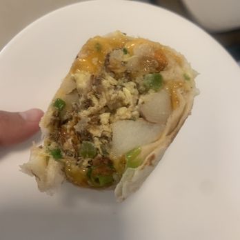 Sweet E's Cafe - Breakfast burrito with Kailua pork and herbed potatoes instead of hash browns - Cafes Near Me - Honolulu, Hawaii Sweet E's Cafe - Breakfast burrito with Kailua pork and herbed potatoes instead of hash browns - Cafes Near Me - Honolulu, Hawaii