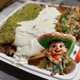La vida es buena, comamos super nachos. (Translation: this is a cheeseburger)