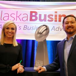 Alaska Business magazine - Kari Bustamante, KTUU Morning Edition Anchor, presenting with Charles Bell, Vice President Alaska Business at the 2018 Top 49ers Luncheon