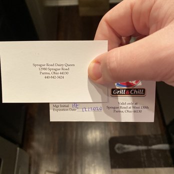 DQ Grill & Chill Restaurant - a hand holding a business card - Ice Cream & Frozen Yogurt Near Me - Parma, Ohio DQ Grill & Chill Restaurant - a hand holding a business card - Ice Cream & Frozen Yogurt Near Me - Parma, Ohio