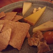 Photo of The Bachelor Farmer - Minneapolis, MN, United States. Northern cheeses, oat crackers, honey, hazelnuts, sunflower seed brittle, squash jam  19