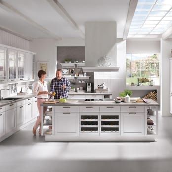 Europa Remodeling - a man and woman in the kitchen - General Contractors Near Me - Katy, Texas Europa Remodeling - a man and woman in the kitchen - General Contractors Near Me - Katy, Texas