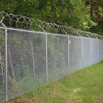 Farm City Fence - Commercial Chain Link with Razor Wire - Fences & Gates Near Me - Hermiston, Oregon Farm City Fence - Commercial Chain Link with Razor Wire - Fences & Gates Near Me - Hermiston, Oregon