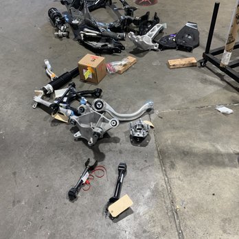 Mike's Alignment - Mike's shop was repairing a MY's front and rear suspension. All the parts were laid out to see if everything was there for replacement. - Auto Repair Near Me - Los Angeles, California Mike's Alignment - Mike's shop was repairing a MY's front and rear suspension. All the parts were laid out to see if everything was there for replacement. - Auto Repair Near Me - Los Angeles, California