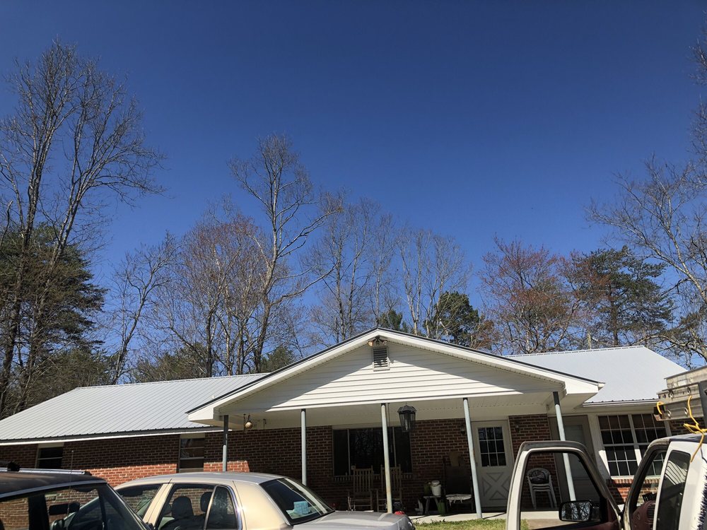 Slide of Sutton Roofing & Construction Company