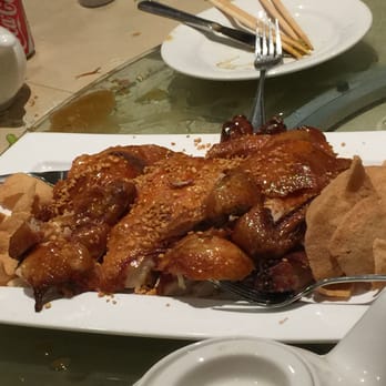 Pomelo Asian Cuisine - Crispy Chicken Chinese Style with roasted garlic and chips - Thai Near Me - Burlington, Ontario Pomelo Asian Cuisine - Crispy Chicken Chinese Style with roasted garlic and chips - Thai Near Me - Burlington, Ontario