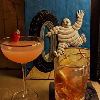 Hall - a drink and a sign for michel michel - Japanese Near Me - New York, New York
