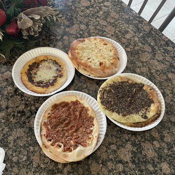 Maatouk Bakery - three different types of pizza - Bakeries Near Me - Sterling Heights, Michigan