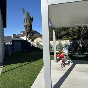 Waterfall Pools - Artificial grass play area - Pool & Hot Tub Service Near Me