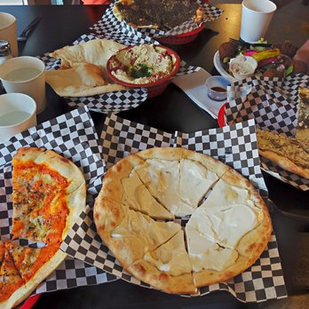 Man'oushe Express - A variety of delicious flat breads. - Pizza Near Me - Seattle, Washington Man'oushe Express - A variety of delicious flat breads. - Pizza Near Me - Seattle, Washington