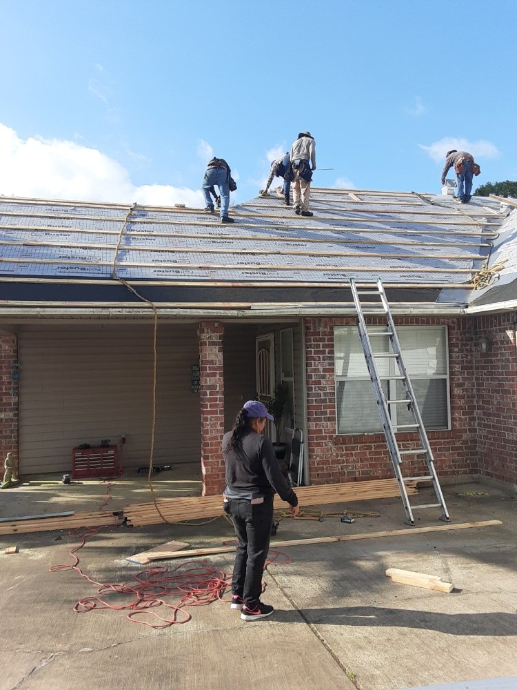 Slide of On Point Roofing