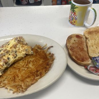 Eddie's Cafe - Meat lovers with cheese three egg omelette with sour dough toast and endless coffee. - Breakfast & Brunch Near Me - San Francisco, California Eddie's Cafe - Meat lovers with cheese three egg omelette with sour dough toast and endless coffee. - Breakfast & Brunch Near Me - San Francisco, California