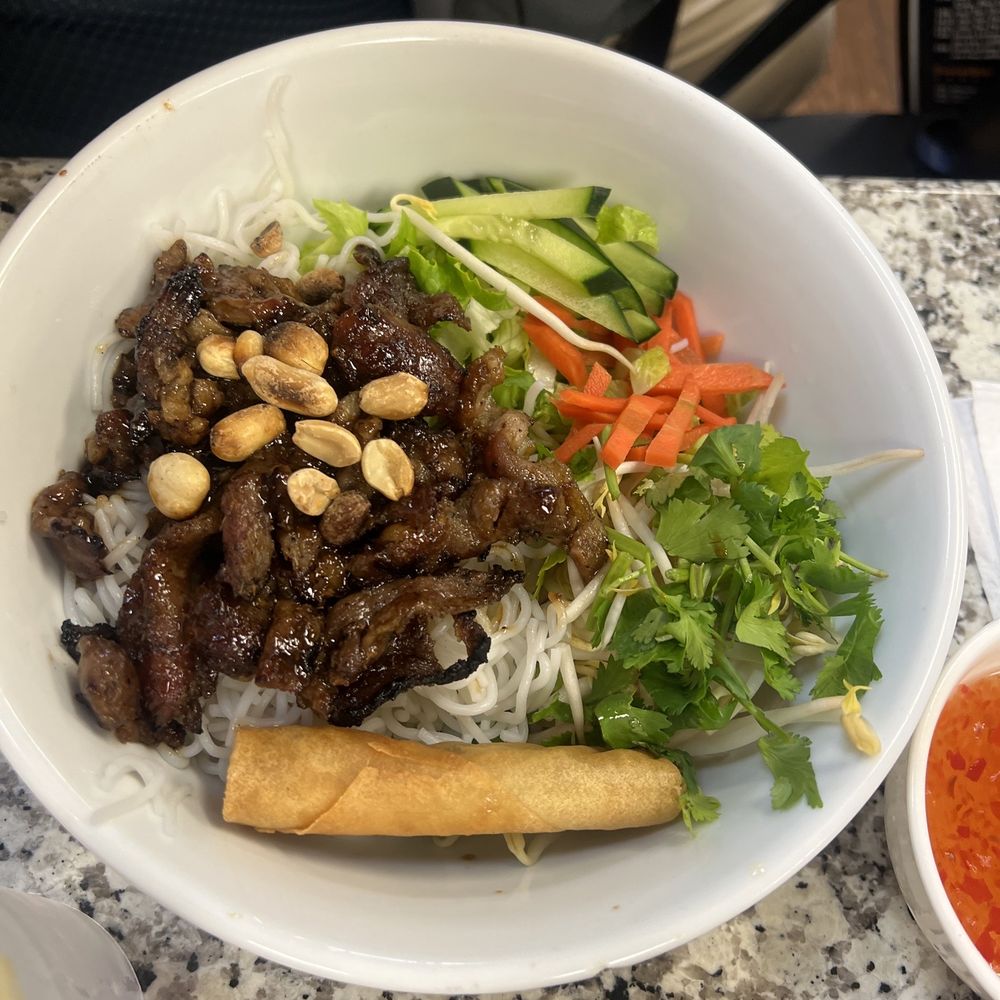Pho Dat Vietnamese Cafe - Vermicelli pork with egg roll (added on) - Vietnamese Near Me - Montgomery, Texas Pho Dat Vietnamese Cafe - Vermicelli pork with egg roll (added on) - Vietnamese Near Me - Montgomery, Texas