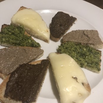 Grappolo Blu - Mixture of crostini. Liver. Truffle. Pesto. Cheese. - Italian Near Me Grappolo Blu - Mixture of crostini. Liver. Truffle. Pesto. Cheese. - Italian Near Me