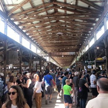 Ithaca Farmers' Market - Walking down the main corridor of the market - Farmers Market Near Me - Ithaca, New York