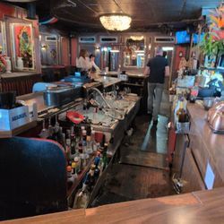 The SRO Lounge - I will bartender Robert and two patrons playing pool in the middle of the day. Only in San Diego. Looks like two liars oops I mean lawyers