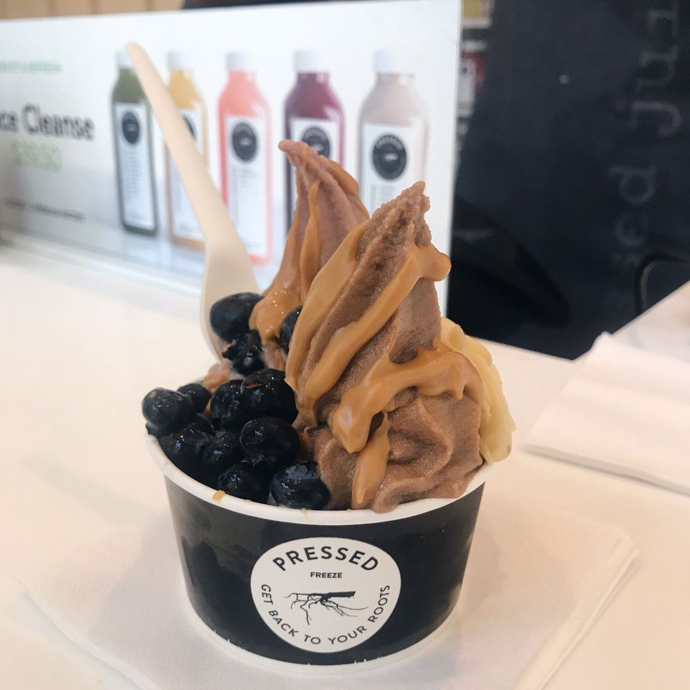 Pressed Juicery - Half strawberry and half chocolate freeze w/ blueberries, almond butter and shaved almonds - Juice Bars & Smoothies Near Me - Glendale, California Pressed Juicery - Half strawberry and half chocolate freeze w/ blueberries, almond butter and shaved almonds - Juice Bars & Smoothies Near Me - Glendale, California