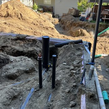 King Plumbing - a view of a trench and pipes - Plumbing Near Me King Plumbing - a view of a trench and pipes - Plumbing Near Me