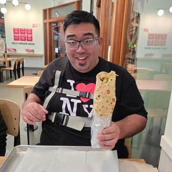 The Kebab Shop - My son getting ready to enjoy his chicken wrap !! - Mediterranean Near Me - Brea, California The Kebab Shop - My son getting ready to enjoy his chicken wrap !! - Mediterranean Near Me - Brea, California