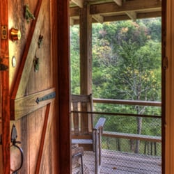 Retreat at Sky Ridge - Private covered porch with swing & rockers. Pond & lake view cabins available.
