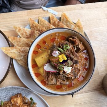 Khao San Pearl - 22. Mussamun Curry Short Ribs with Roti - Tapas/Small Plates Near Me - Portland, Oregon Khao San Pearl - 22. Mussamun Curry Short Ribs with Roti - Tapas/Small Plates Near Me - Portland, Oregon