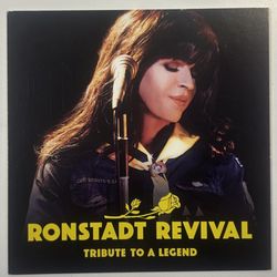 We offer Expert wig styling! See one of our clients as Linda Ronstadt, wig by Enid's. Experience our craft & see Ronstadt Revival live!