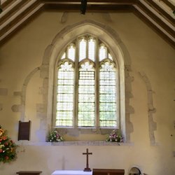 East window, Perpendicular Gothic, replacing earlier lancets (see remaining jambs)
