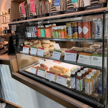 JJ Bean - a display case filled with food items - Coffee & Tea Near Me - Burnaby, British Columbia