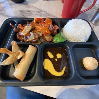 Hong Kong Station - Pepper steak with steamed rice, wonton, egg roll and mystery dough ball. - Chinese Near Me - Centennial, Colorado