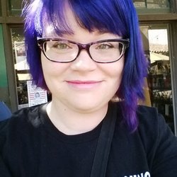 Paul used semi-permanent color to give me a really cool dye job with purple, pink, and blue. This is how it looked after the color was done.