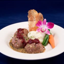 The Strand Waterfront Dining Room - Lutsen Resort - Swedish Meatballs: Served with creamy mushroom gravy, lingonberries, roasted garlic whipped potatoes, and vegetable du jour.