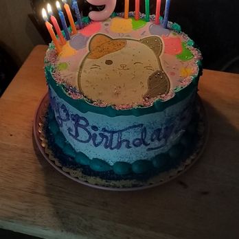 QFC - disclaimer: we accidentally bumped the  cake on the way home, smudging the top border, and added colored sugar sprinkles for camouflage. - Grocery Near Me - Seattle, Washington