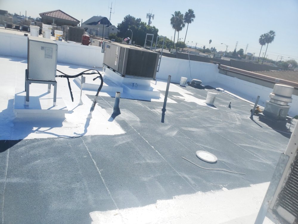 Slide of Berber-Bravo Roofing