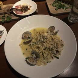 Clam linguine with Alfredo in the background