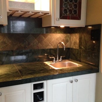 Innovative Tile & Stone - Marble Bar countertop with tumbled Marble decorative band on backsplash - General Contractors Near Me - Gresham, Oregon Innovative Tile & Stone - Marble Bar countertop with tumbled Marble decorative band on backsplash - General Contractors Near Me - Gresham, Oregon