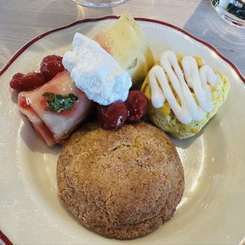 Safta - Dessert: Blintz w/ cherries & whipped cream (top left), apricot pastry (top right), Snickerdoodle cookie (center) - Middle Eastern Near Me - Denver, Colorado
