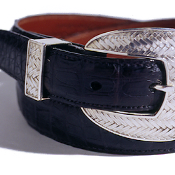 Beautiful hand rendered silver buckles.