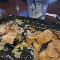 High Rollers Luxury Lanes & Sports Lounge - I just dug in but this is a burger on a gluten free bun with a side of chips..