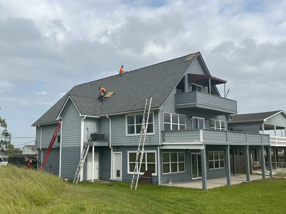 Slide of Archie's Roofing & Construction