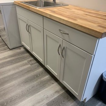 Precision Floors - a kitchen with a washer and dryer - Carpeting Near Me - Thornwood, New York Precision Floors - a kitchen with a washer and dryer - Carpeting Near Me - Thornwood, New York