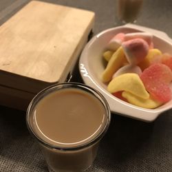 Bite Club - The check comes with a bowl of gummy candies and a shot of chocolate liquor!