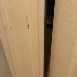 Brown splatter on trim next to toilet Brown splatter on trim next to toilet